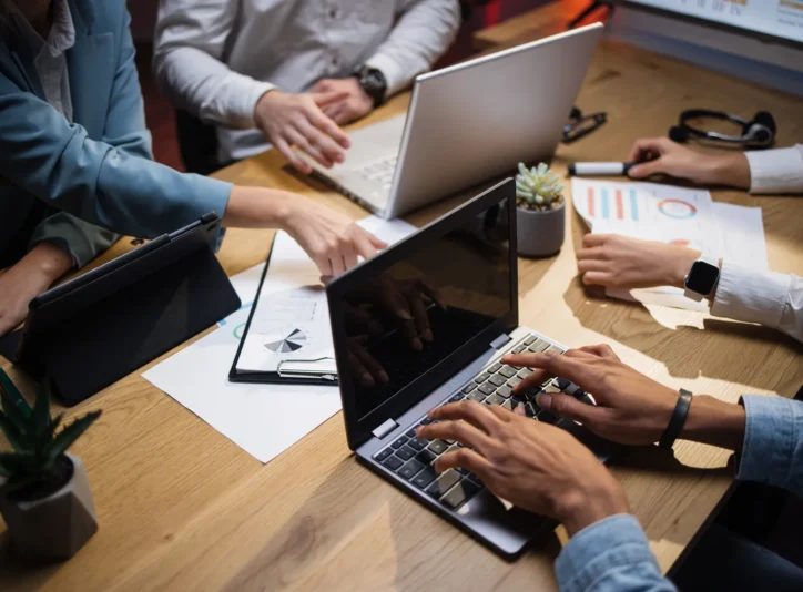 multi-ethnic-company-workers-using-gadgets-at-offi-2024-12-13-05-39-00-utc